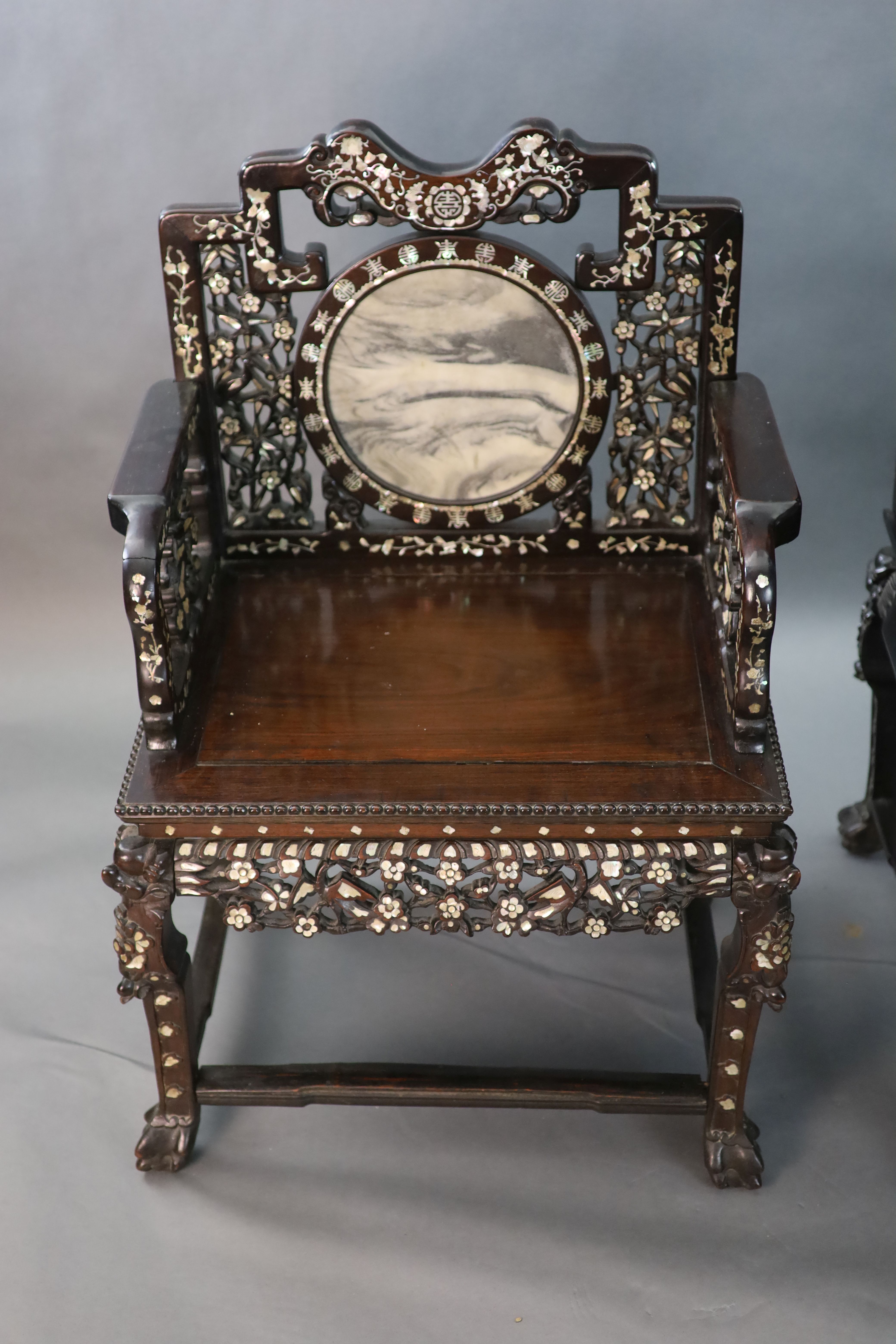 An impressive pair of Chinese hongmu and mother of pearl inlaid throne armchairs, c.1910, 70cm wide, 103cm high, Provenance - A. T. Arb